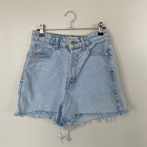 Zara denim shorts with distressed hem. Size 4.
